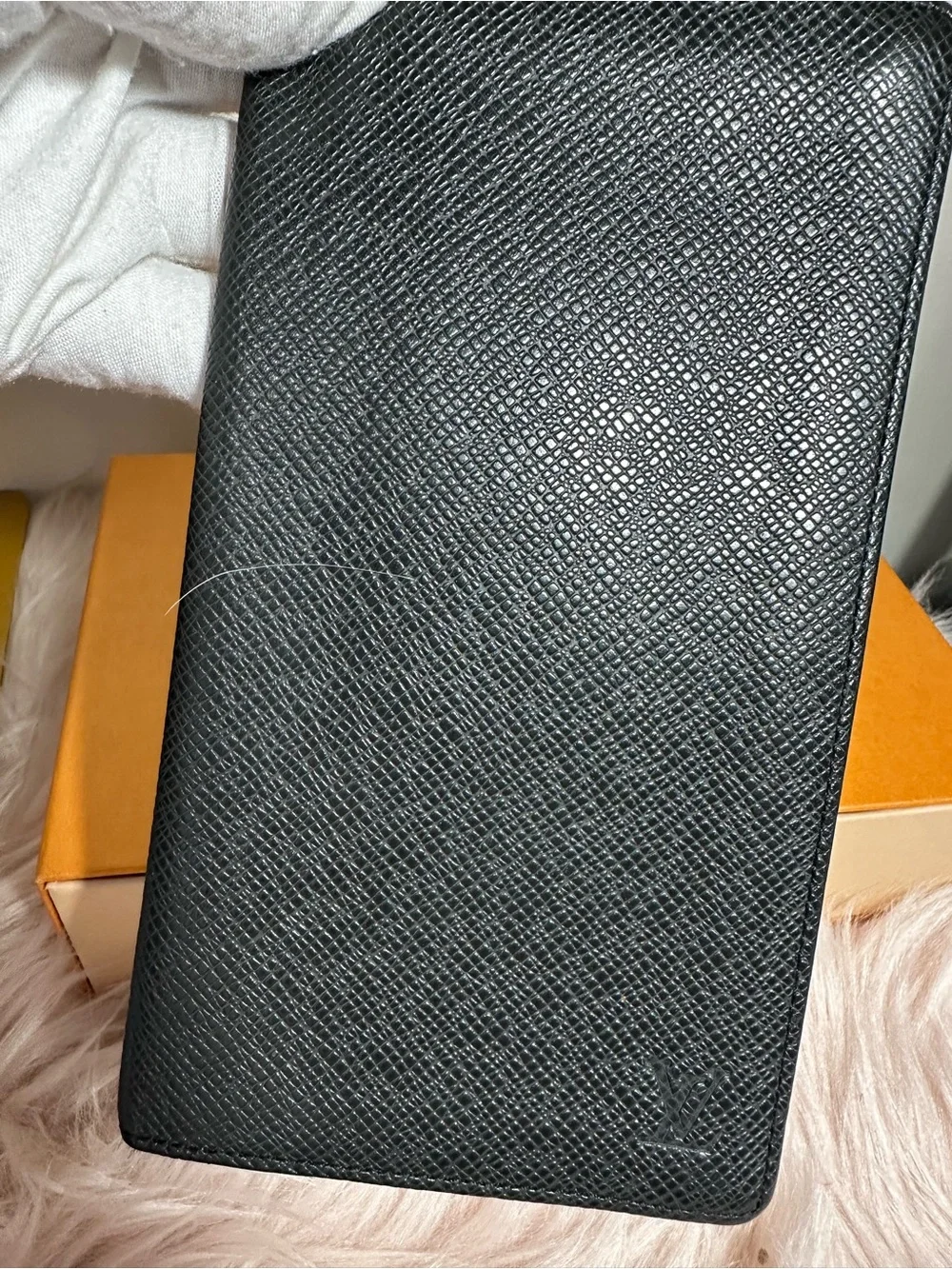 Louis Vuitton bifold wallet in Taiga Leather